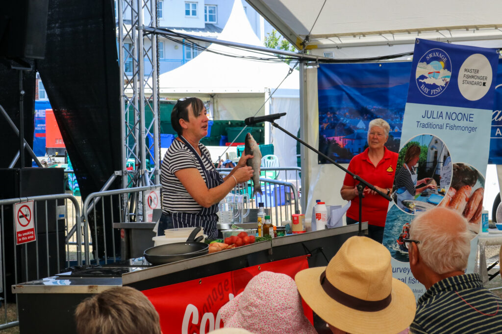 Swanage Bay Fish demonstration in the Swanage Carnival marquee