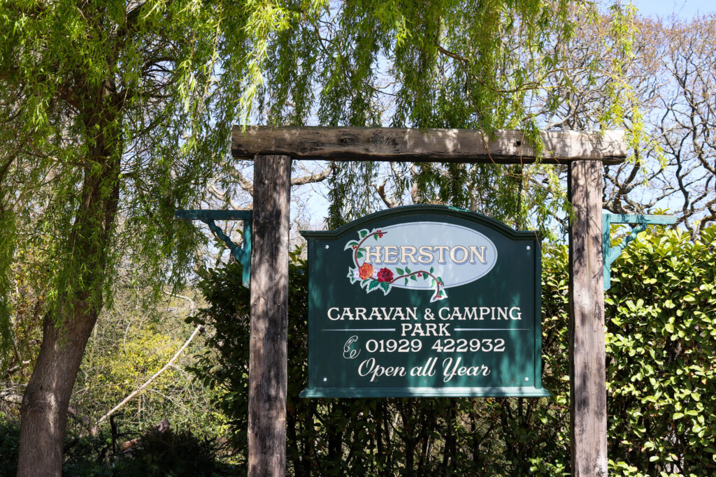 Entrance sign at Herston Caravan & Camping Park
