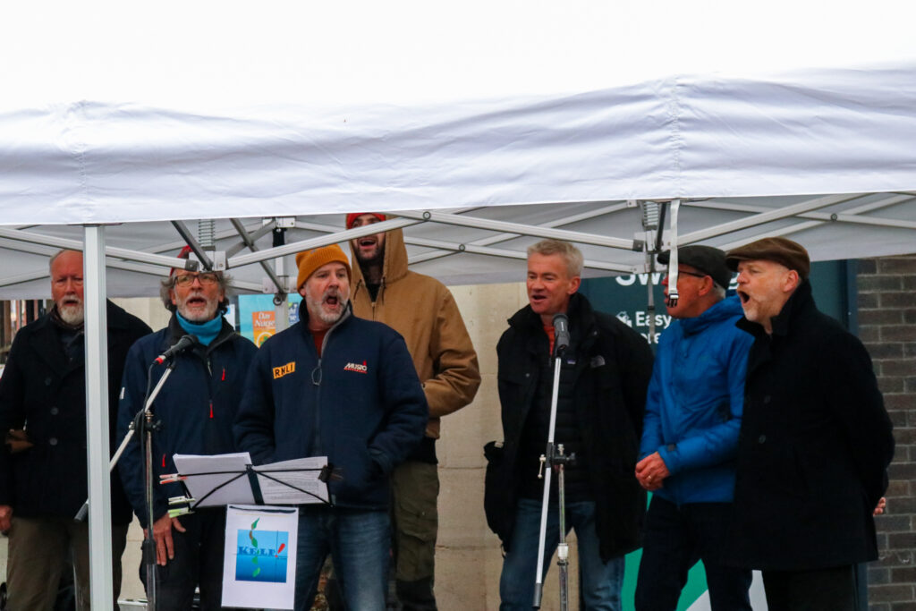 Sea shanty singers Kelp on stage at Swanage Christmas Market