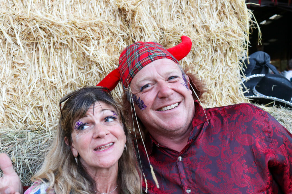 Man with red horns at Purbeck Valley Folk Festival