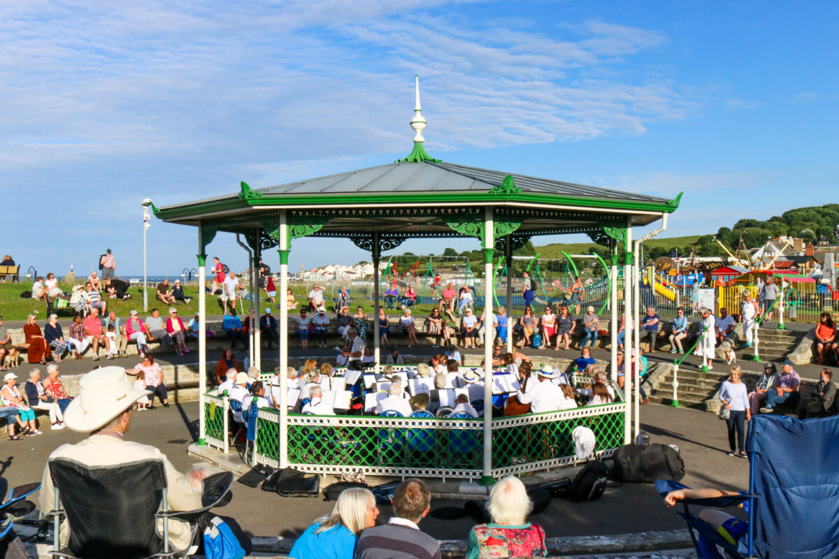 Swanage Town band playing at the town's bandstand