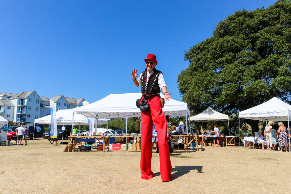 Man on stilts at Swanage & Purbeck Rotary Fair