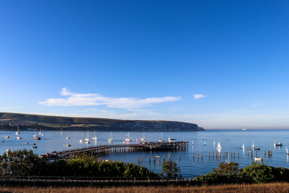 Swanage Pier, the old pier and the Ballard Down headland