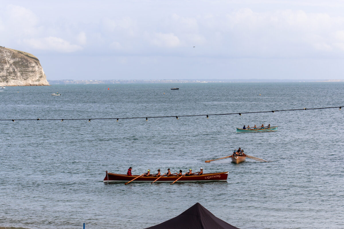 Gig racers in Swanage Bay