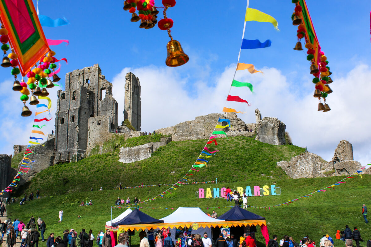 Holi celebration in the grounds of Corfe Castle